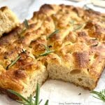 Bake this fluffy, golden sourdough focaccia recipe with olive oil and herbs. Crispy on the outside, airy inside, and full of sourdough flavor
