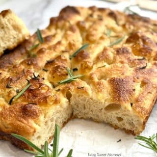 Bake this fluffy, golden sourdough focaccia recipe with olive oil and herbs. Crispy on the outside, airy inside, and full of sourdough flavor