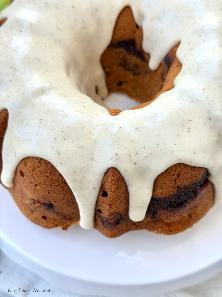 This moist Apple Bundt Cake is loaded with fresh apples, a gooey cinnamon swirl, and topped with an irresistible brown butter glaze.