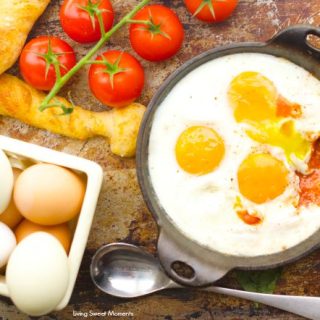 Baked Eggs With Goat Cheese And Tomato - delicious eggs are baked in a homemade tomato sauce and goat cheese. Perfect for breakfast, lunch and dinner. More on www.livingsweetmoments.com