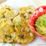 Baked Tostones With Guasacaca Sauce Recipe: easy plantains are crispy baked and served with a Venezuelan avocado dip that's perfect as a dinner side dish.
