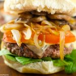 Burger With Caramelized Onions And Mushrooms: Juicy beef burgers w/ homemade sauce topped with sautéed mushrooms and caramelized onions. Perfect for dinner!