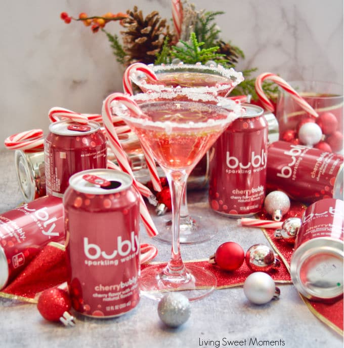 Treat yourself these Holidays with a fizzy Candy Cane Cosmopolitan mocktail that is delicious, easy to make, and great for the whole family