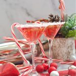 Treat yourself these Holidays with a fizzy Candy Cane Cosmopolitan mocktail that is delicious, easy to make, and great for the whole family