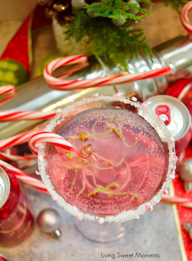 Treat yourself these Holidays with a fizzy Candy Cane Cosmopolitan mocktail that is delicious, easy to make, and great for the whole family