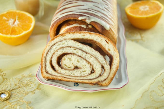 This Chai Spiced Bread is the perfect fluffy white loaf of bread, swirled with gooey chai spice and sugar in the middle topped with a sweet & tangy orange glaze