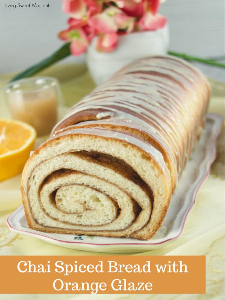 This Chai Spiced Bread is the perfect fluffy white loaf of bread, swirled with gooey chai spice and sugar in the middle topped with a sweet & tangy orange glaze