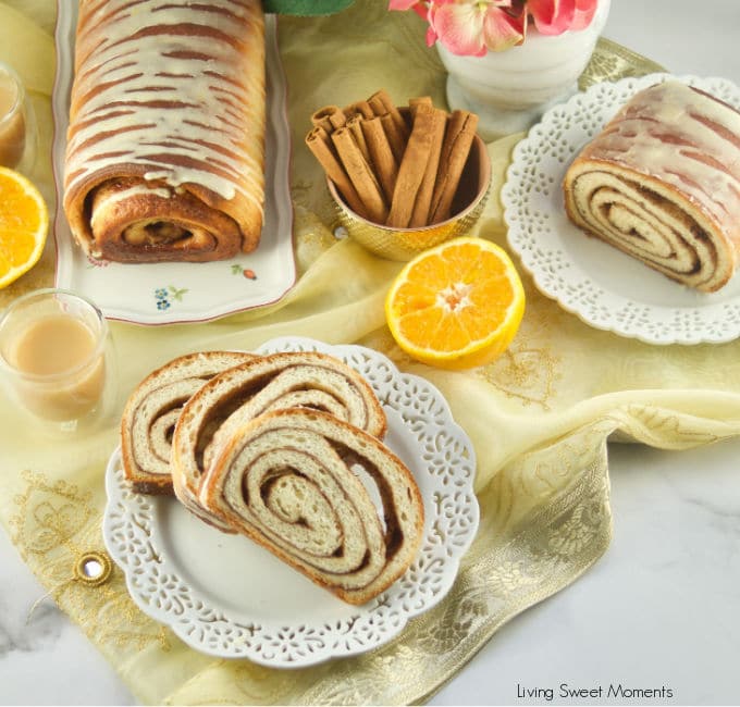 This Chai Spiced Bread is the perfect fluffy white loaf of bread, swirled with gooey chai spice and sugar in the middle topped with a sweet & tangy orange glaze