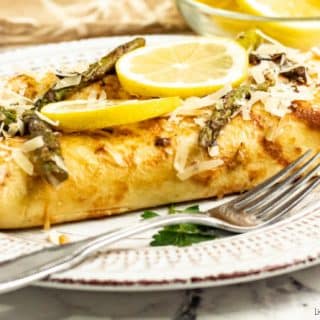 Easy enough for weeknight, and fancy enough for entertaining, these cheesy Chicken Asparagus Crepes are delicious and will leave you satisfied 