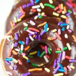 chocolate glazed baked donuts - this delicious dessert is easy to make and perfect for parties and celebrations. Donuts are baked and glazed with chocolate.