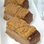 This yummy Chocolate Magic Custard Cake recipe is super easy is the perfect dessert for any party. One cake batter magically creates 3 layers in the oven!