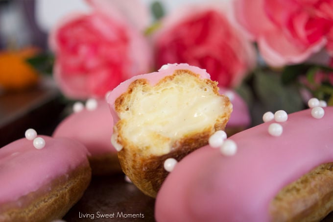 These delicate vanilla eclairs features a crunchy pate au choux filled homemade vanilla pastry cream and topped with a sweet glaze. A classic french pastry.