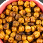 Roasted Crispy Chickpeas: this healthy snack is crunchy and delicious. You'll think you're eating chips! Tossed in spice for amazing taste and texture. Yum!