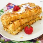 This Crunchy French Toast recipe is crusted with cinnamon cereal and sauteed with butter. The perfect quick breakfast or brunch idea for kids and adults.