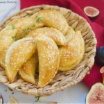 These delicious Fig & Cheese Empanadas are baked to perfection with a sprinkling of sesame seeds. Perfect to serve as fancy appetizers