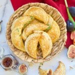 These delicious Fig & Cheese Empanadas are baked to perfection with a sprinkling of sesame seeds. Perfect to serve as fancy appetizers