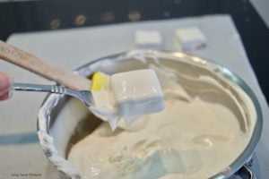This delicious Gingerbread Holiday Fudge is perfect for Christmas parties and to give as DIY Gifts. Serve it in a present shape or decorate with sprinkles.