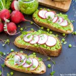 This delicious Pea Hummus Crostini recipe is easy and perfect for a Spring appetizer. Made with mint and tahini that gives a unique flavor. Vegan as well