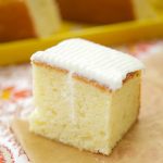 These scrumptious from scratch Lemon Snack Cakes are filled with lemon creme and topped with lemon frosting. Perfect recipe for dessert or the lunchbox.