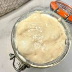 Learn how to make a sourdough starter from scratch in just 7 days that is bubbly and ready to bake. Step-by-step photos and tips included