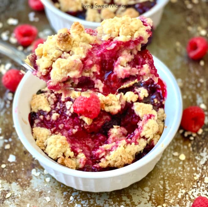Served warm from the oven to table, this delicious Berry Crisp whips up in minutes using frozen berries. The perfect last-minute dessert that feeds a crowd