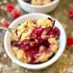 Served warm from the oven to table, this delicious Berry Crisp whips up in minutes using frozen berries. The perfect last-minute dessert that feeds a crowd