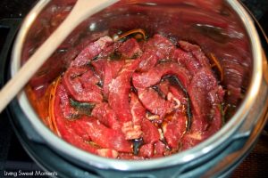 Gotta love instant pot Asian recipes! This instant pot Mongolian beef is made with flank steak & is ready in 20 minutes. Perfect for a quick weeknight meal