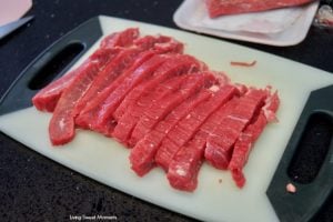 Gotta love instant pot Asian recipes! This instant pot Mongolian beef is made with flank steak & is ready in 20 minutes. Perfect for a quick weeknight meal