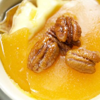 This delicious Maple Creme Brûlée recipe only requires 5 ingredients and is served with candied pecans for extra flavor and crunch. A perfect fancy dessert.