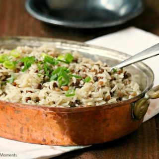 This delicious Mujaddara recipe is an entree made with rice, lentils and rich spices for an easy middle eastern dish that will wow your family for dinner.