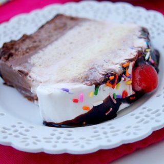 Neapolitan Ice Cream Cake - This delicious cake features 3 layers of cake, 3 layers of ice cream, and whipped cream on top. Perfect dessert for summer yum!