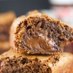 Nutella Stuffed Brownies - the best fudgey brownies recipe filled with an ooey gooey center of Nutella. The perfect chocolate dessert for any occasion. More on www.livingsweetmoments.com