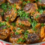 One Pan Pasta And Meatballs: the perfect one pot meal dinner idea! Tender homemade meatballs are cooked inside a tomato basil sauce served with penne pasta.