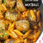 One Pan Pasta And Meatballs: the perfect one pot meal dinner idea! Tender homemade meatballs are cooked inside a tomato basil sauce served with penne pasta.