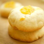 This delicious thumbprint cookie recipe is made with homemade passion fruit curd in a shortbread cookie dough. Perfect for dessert and tea. Yummy!