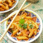 This easy and delicious Penne Alla Vodka recipe is ready in 20 minutes or less and is the perfect quick weeknight dinner idea for the family. Vegetarian too