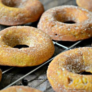 Baked Pumpkin Doughnuts - These are the best fall doughnuts you will ever try! They are so soft and moist and loaded with pumpkin/cinnamon flavor! Yummy!