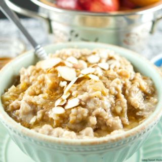 This delicious Slow Cooker Apple Oatmeal cooks overnight. It's vegan, healthy and full of flavor. Wake up to a hot bowl of apple pie oatmeal full of spice.