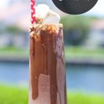 s'mores shakes - Delicious Chocolate shakes with marshmallows and graham crackers topped with toasted marshmallows. Perfect for summer outdoor entertaining.