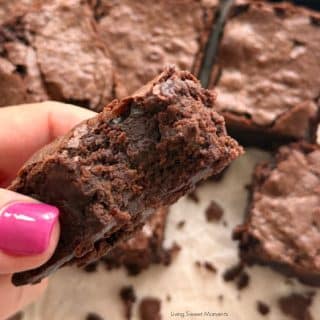 Fudgy sourdough discard brownies with shiny crackly tops, rich chocolate flavor, and a hint of tang, perfect for using up discard