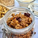 Crunchy, golden sourdough discard granola filled with nutty clusters, a cozy, zero-waste recipe to use your starter and brighten breakfast!