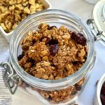 Crunchy, golden sourdough discard granola filled with nutty clusters, a cozy, zero-waste recipe to use your starter and brighten breakfast!