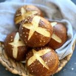 Bake soft and chewy Sourdough Pretzel Buns with a shiny crust! Perfect for burgers, beef sandwiches, or a snack with mustard. Easy recipe!