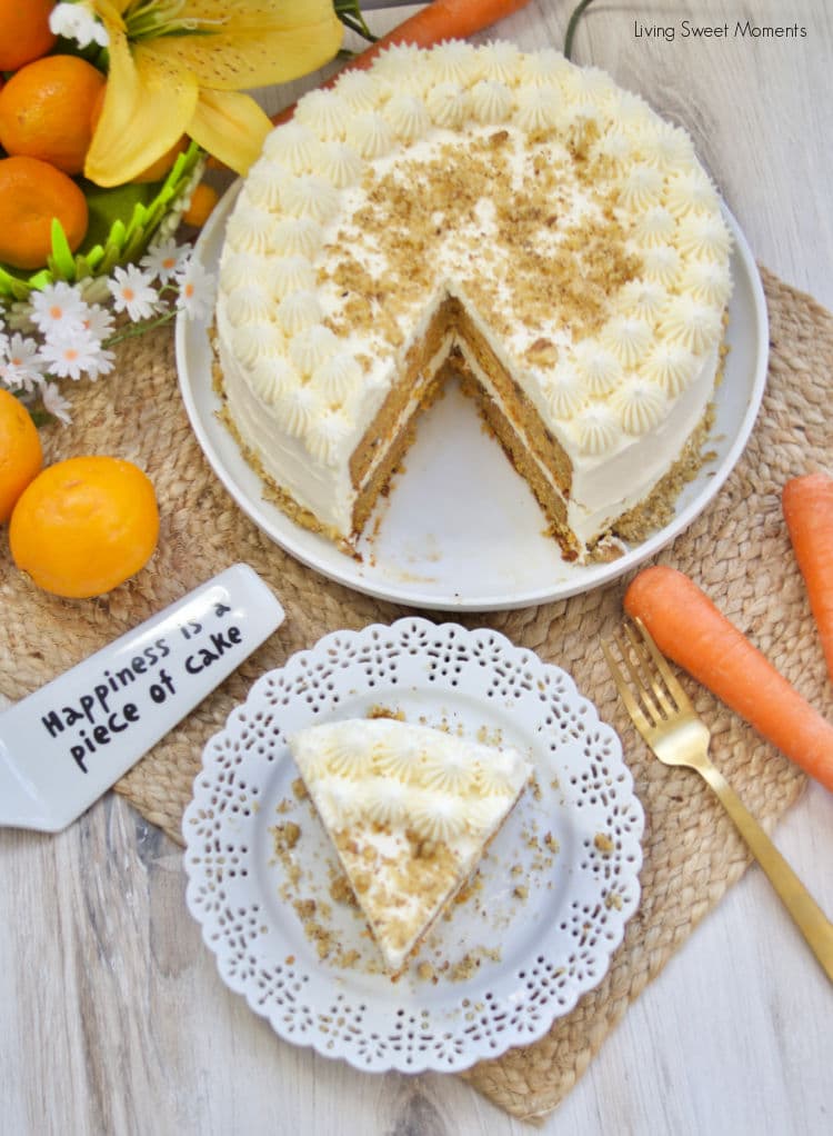 This stunning spiced Orange Ginger Carrot Cake is moist, tender, and delicious. Covered with cream cheese frosting. Have a slice!