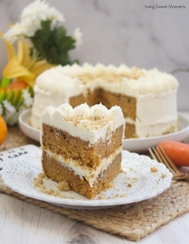 This stunning spiced Orange Ginger Carrot Cake is moist, tender, and delicious. Covered with cream cheese frosting. Have a slice!