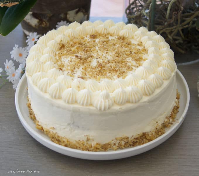This stunning spiced Orange Ginger Carrot Cake is moist, tender, and delicious. Covered with cream cheese frosting. Have a slice!