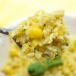 This Spicy Mango Rice recipe is easy to make and delicious. The perfect side dish to any dinner or for entertaining. Made with chili, cilantro, lime & mango