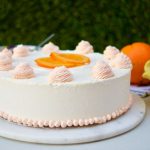 This amazing Succulent Orange Curd Cake consists of 3 layers of moist orange cake filled with orange curd and topped with Swiss vanilla buttercream.