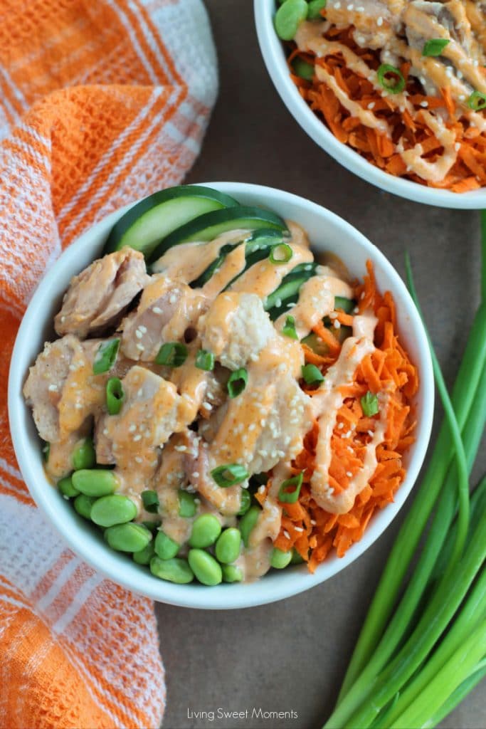 For an easy and quick dinner, these delicious teriyaki salmon bowls are topped with spicy mayo and served with warm rice and veggies