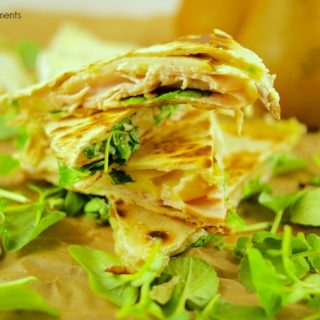 These delicious Turkey Brie Quesadillas have a touch of pear and are perfect for a quick weeknight dinner idea under 10 minutes or as a party appetizer. Yummy!!